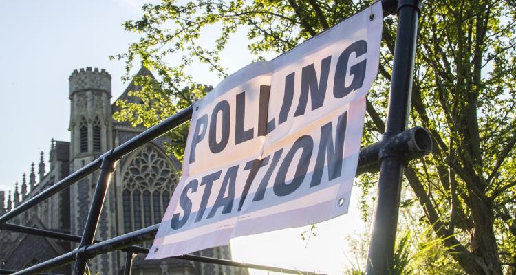 A sign that reads "POLLING STATION"