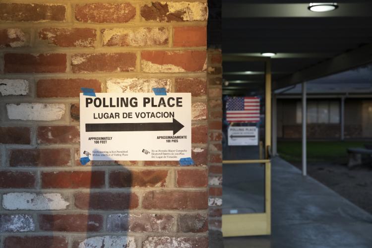 "Polling Place, Lugar de Votacion" sign out a polling location