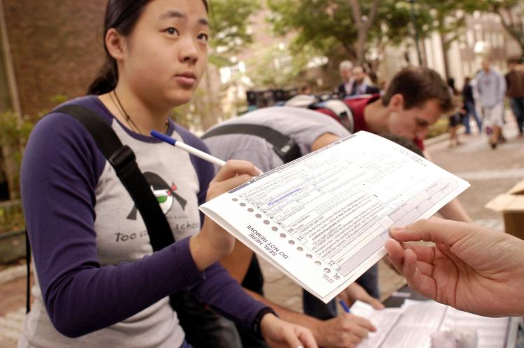 Students registering to vote on a college campus