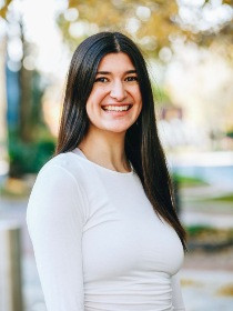 Headshot of Maxy Grasso smiling