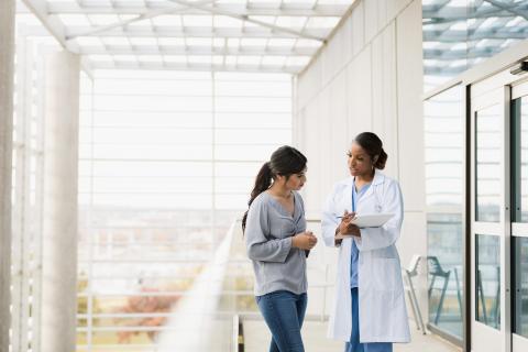 Doctor speaking to patient