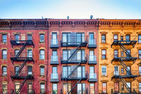 Housing units with three buildings next to each other