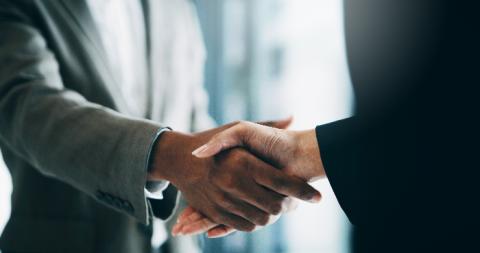 Two people shaking hands 