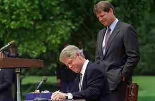 President William J. Clinton Signing H.R. 2254, the Omnibus Budget Reconciliation Act of 1993