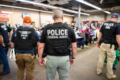 U.S. Immigration and Customs Enforcement agents and police