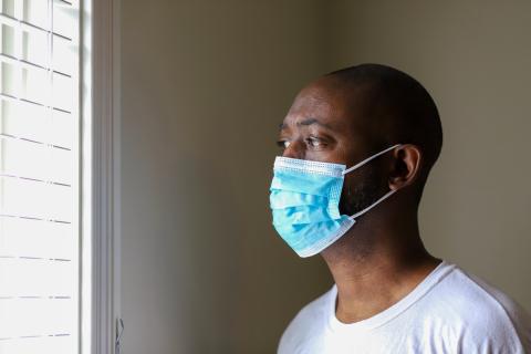 Black man wearing a mask 