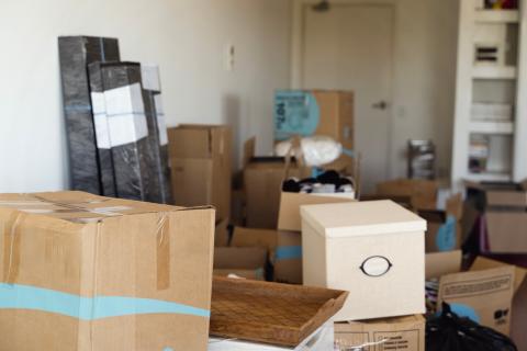Cardboard moving boxes stacked together