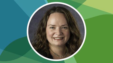 Headshot of Joan Maya Mazelis against SSN's blue-green texture file