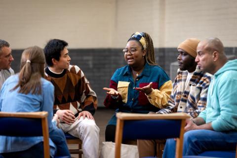 group of people chatting in a group