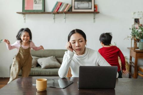 tired working mom with two kids