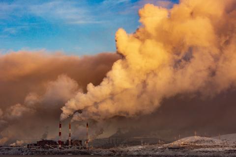 Pollution smoke coming from factory pipes 