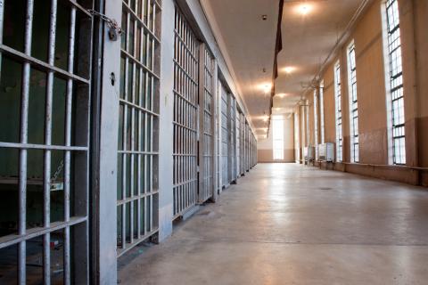 jail cells and hallway inside a prison 