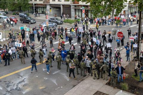 Protesters amass on the street to protest against ICE presence in Portland, Oregon