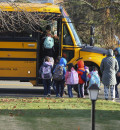 Children on line for a school bus