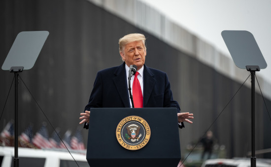 Trump giving a speech at a podium