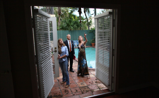 A family looking at a home, real estate 