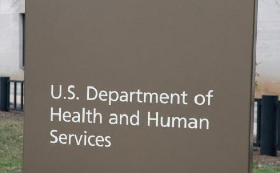 Department of Health and Human Services sign outside of buildingNi
